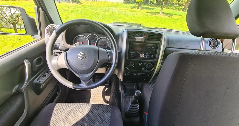 Suzuki Jimny cena 64600 przebieg: 153700, rok produkcji 2016 z Puszczykowo małe 137